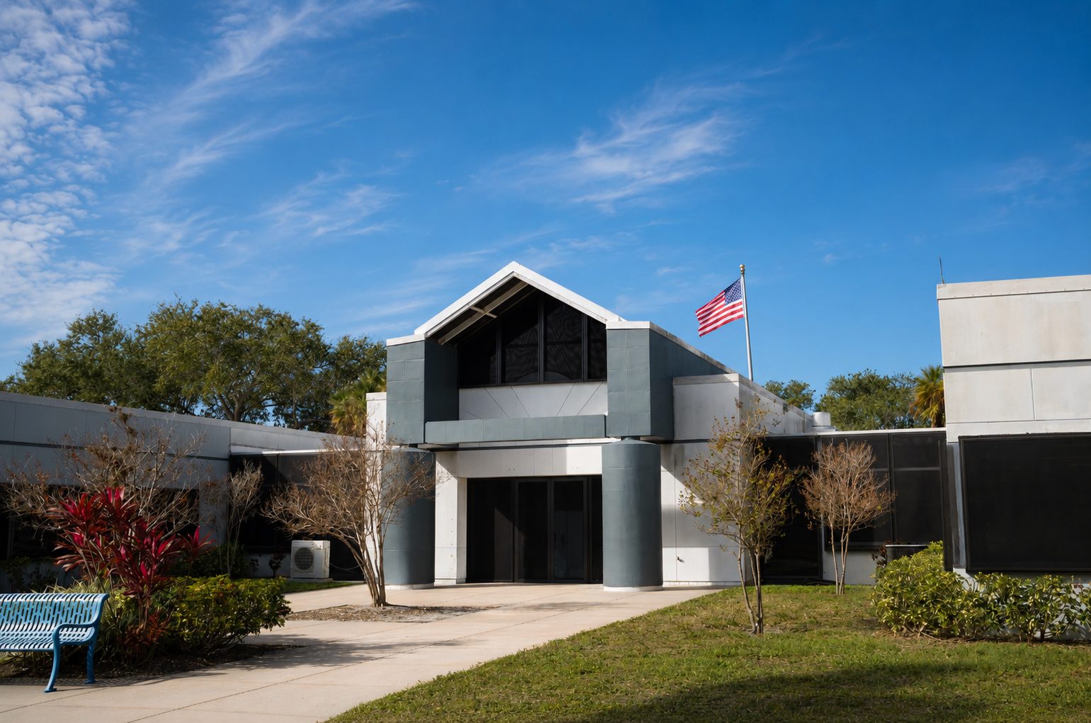 Close view of dark-framed Fortress security screens on commercial medical facility windows