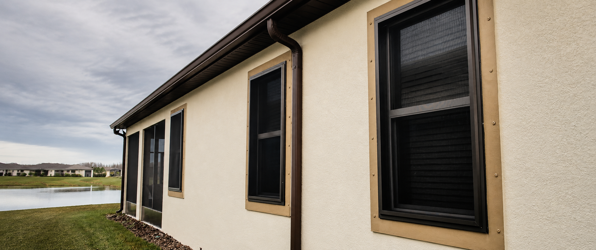 Window Installation Florida home protected by custom Fortress stainless steel screens